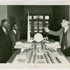 Liberia Participation - Walter F. Walker and son looking at model