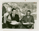 Liberia Participation - Grover Whalen and Walter F. Walker signing contract