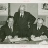 Lithuania Participation - Jonas Budrys (Consul General) and Grover Whalen sign contract