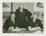 Lithuania Participation - Jonas Budrys (Consul General) and Grover Whalen sign contract