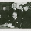 Lithuania Participation - Povilas Zadeikis signs book, with Jonas Budrys (Consul General) and group