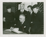 Lithuania Participation - Povilas Zadeikis signs book, with Jonas Budrys (Consul General) and group