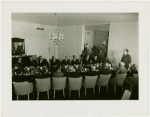 Luncheons and Dinners - Grover Whalen addressing group at table