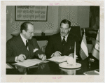 Luxembourg Participation - William H. Hamilton (Commissioner General) and Grover Whalen sign contract