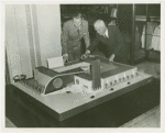 Man Building - Walter Hoving (Lord and Taylor) and John Starbuck look at model