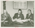 Man Building - Grover Whalen and William C. Segal and John Starbuck at contract signing