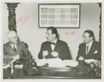 Man Building - Grover Whalen, William C. Segal and John Starbuck at contract signing