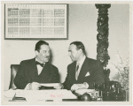 Man Building - William C. Segal hands Grover Whalen check