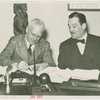 Man Building - Grover Whalen and John Starbuck at contract signing