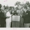 Man Building - Fiorello LaGuardia and group laying cornerstone