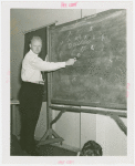 Man Building - Bill Kern (Carnegie Tech) show plays on chalkboard