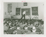 Man Building - Bill Kern (Carnegie Tech) demonstrates plays on chalkboard
