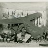 Medicine and Public Health - Diorama of radium being loaded onto airplane (Francis Rigney)