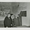 Medicine and Public Health - Men and woman looking at exhibit on social hygiene