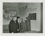 Medicine and Public Health - Men and woman looking at exhibit on social hygiene