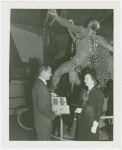 Medicine and Public Health - Man presenting radio to 100,000th visitor to Bayer Aspirin exhibit