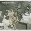 Medicine and Public Health - Nurse demonstrating correct way to bathe baby