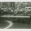 Michigan Participation - Crowd watching model boat in water