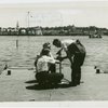 Michigan Participation - Three men on pier