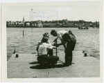 Michigan Participation - Three men on pier