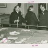 Michigan Participation - Grover Whalen with two officials behind model of Fair