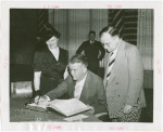Michigan Participation - Harry Kelly signing guestbook