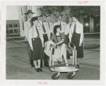 Michigan Participation - Willo Sheridan (Miss Michigan Aviation) - In chair surround by Fair policemen and policewomen