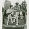 Michigan Participation - Willo Sheridan (Miss Michigan Aviation) - In pushcart talking to woman