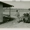 Mosquito protection and control - Men spraying insecticide on building