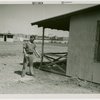 Mosquito protection and control - Man spraying insecticide on building