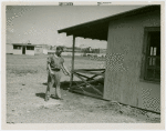 Mosquito protection and control - Man spraying insecticide on building