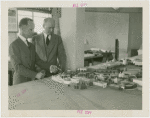 Nebraska Day - Leslie Baker and Gwyer Yates looking at model of Fair