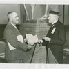 Netherlands - Neil van Aken and Cornelius Kouwenhoven looking at historic deed