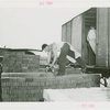 Netherlands - Building - Construction - Bricklayers with bricks