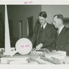 New England Participation - Dudley Harmon and Leslie Baker looking at Fair model