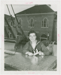 New England Participation - Skipper of S.S. Yankee carving whale's tooth