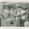 New England Participation - Girl presenting kitten to Caption of S.S. Yankee