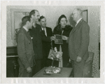 New Jersey Participation - Men and woman with National Home Builders Bureau plaque
