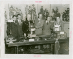 New York State - William Dempsey with officials looking at crime prevention and life saving exhibit