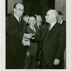New York State - Lehman, Herbert H. (Governor) - Receiving silver trowel from Leonard W. Hall
