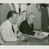 New York State - Lehman, Herbert H. (Governor) - Signing guestbook with Grover Whalen