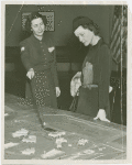 New York World's Fair - Employees - Two women looking at Fair model