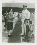 New York World's Fair - Employees - Captain of S.S. Roosevelt buying ticket from cashier