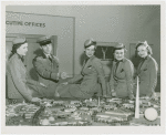 New York World's Fair - Employees - Airline hostesses looking at Fair model