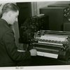 New York World's Fair - Employees - Man loading automatic sorter machine
