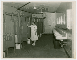 New York World's Fair - Employees - Restroom matron cleaning stall