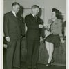 New York World's Fair - Employees - Woman giving check for Greater New York Fund to Harold Dean while Vincent Pach looks on
