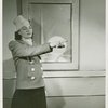 New York World's Fair - Employees - Females - Woman standing in front of Trylon and Perisphere picture