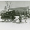 New York World's Fair - Employees - Females - Sledding - Women on horse-driven sled in front of Ford Building