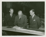 New York World's Fair - Employees - Gibson, Harvey (Chairman of Board) - With men signing papers